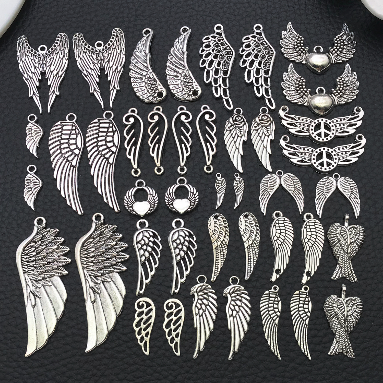 Vintage Fashion Stores - Angel Wing Charms, New 22/42 Pcs